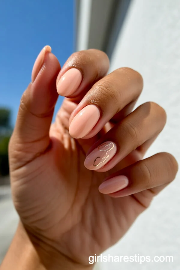 Peach Nude Almond Nails with Gold Accents