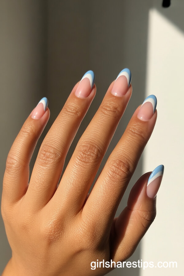 Blue-and-White Wavy French Tip Oval Nails