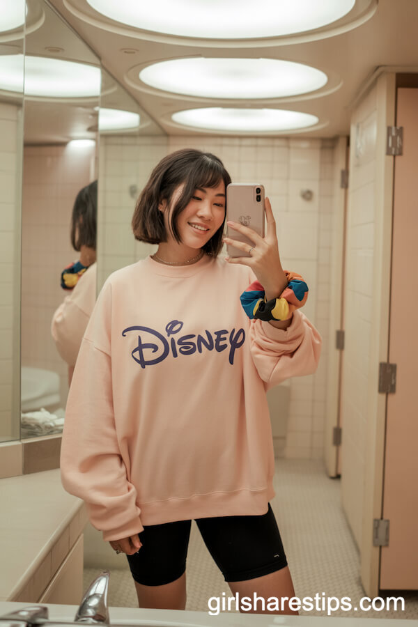 Oversized Pastel Crewneck With Black Bike Shorts and Scrunchie