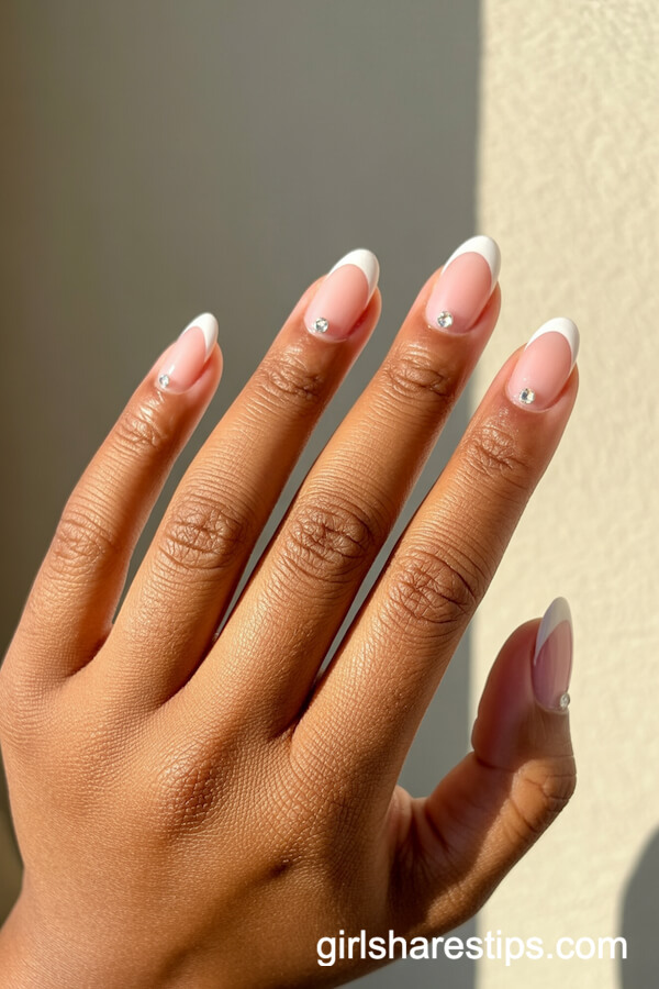 Sheer Pink Oval French Tips with Rhinestone Accents