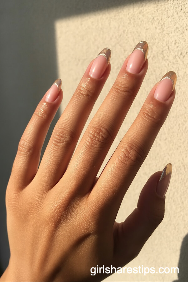 Shimmering Gold Foil French Tips on Oval Nails