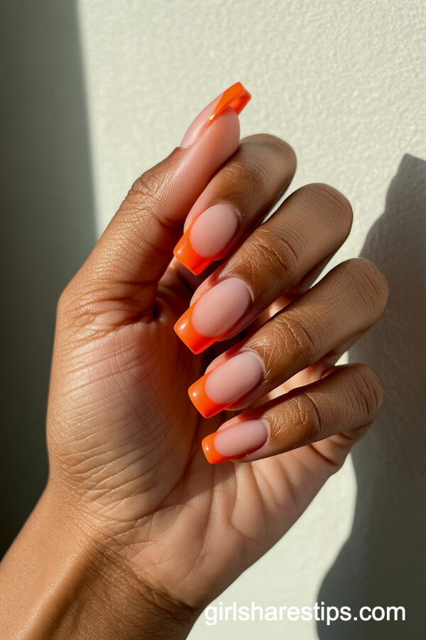Neon Orange Matte French Tips on Coffin Nails