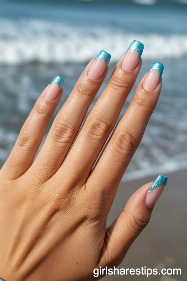 French Manicured Squoval Nails with Sparkling Aqua Glitter Tips
