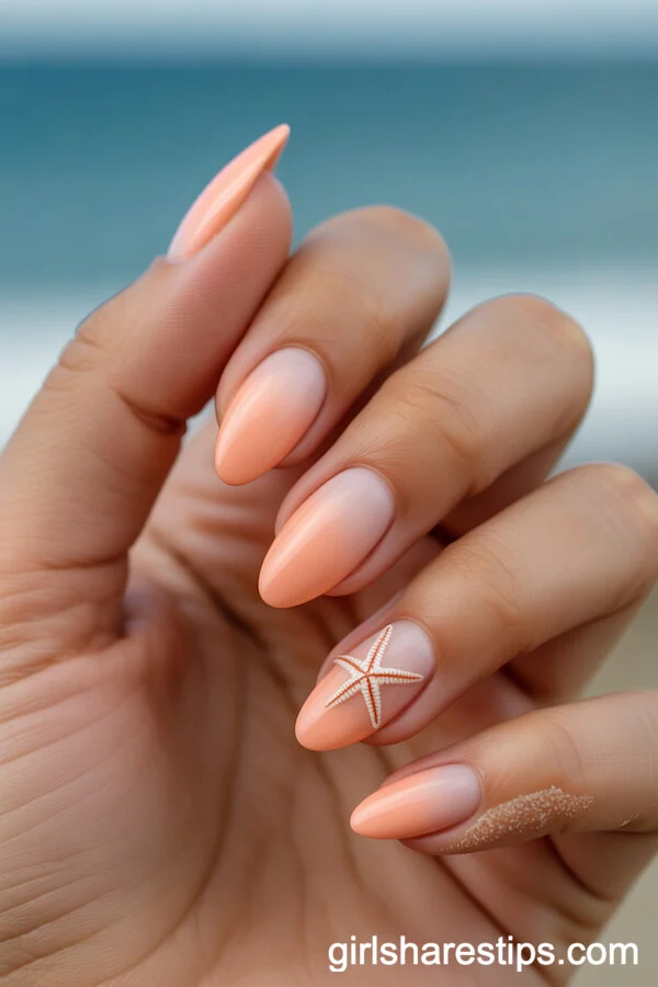 Soft Peach Almond Nails with a White Starfish Accent