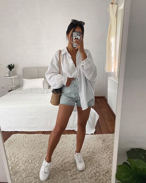 summer shorts outfits with denim shorts and white sneakers