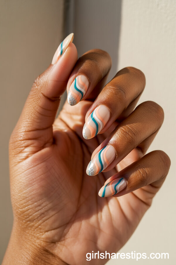 Wavy Glitter Nude Almond Nails