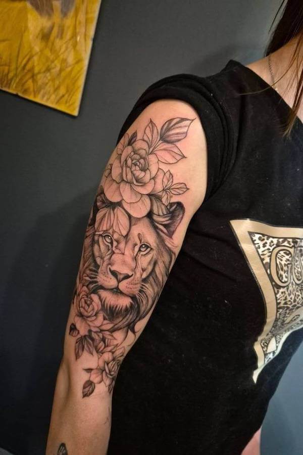 Lion and Floral Arm Tattoo