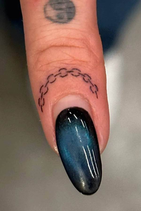 Tiny Chain Finger Tattoo