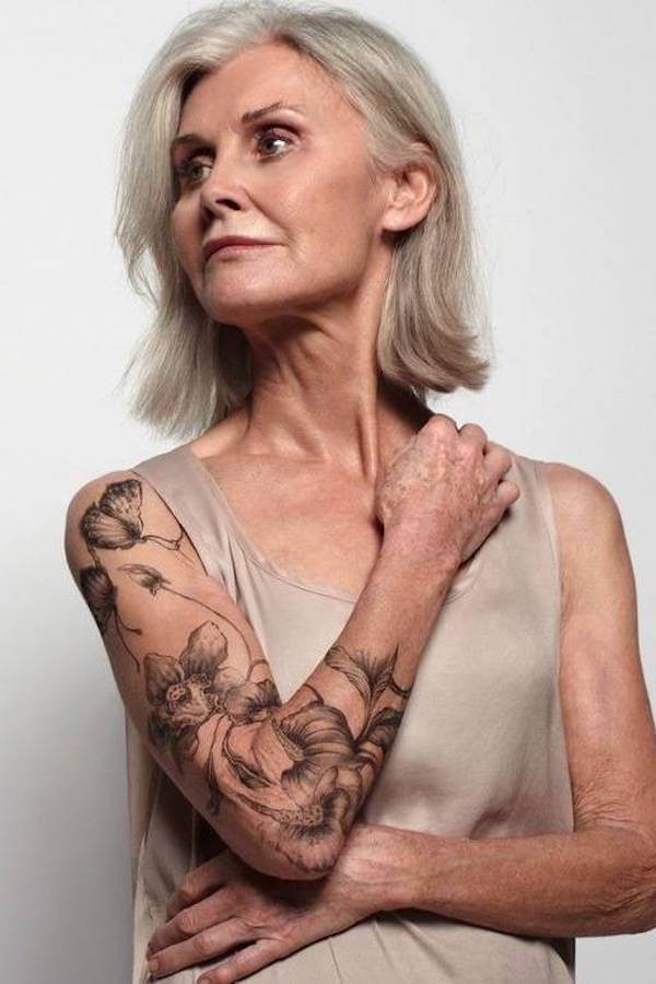 Black and Gray Floral Arm Tattoo
