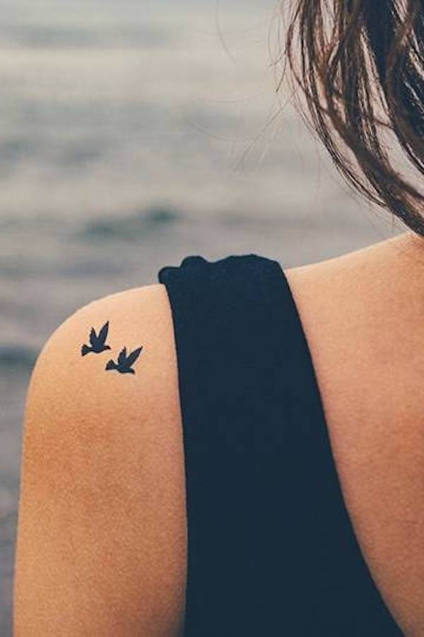 Minimalist Bird Shoulder Tattoo