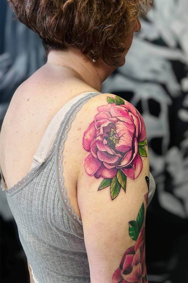 Vibrant Pink Flower Shoulder Tattoo