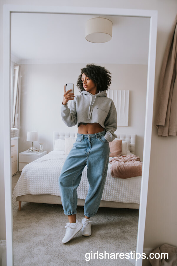 Cropped Grey Hoodie with Baggy Jeans and White Sneakers