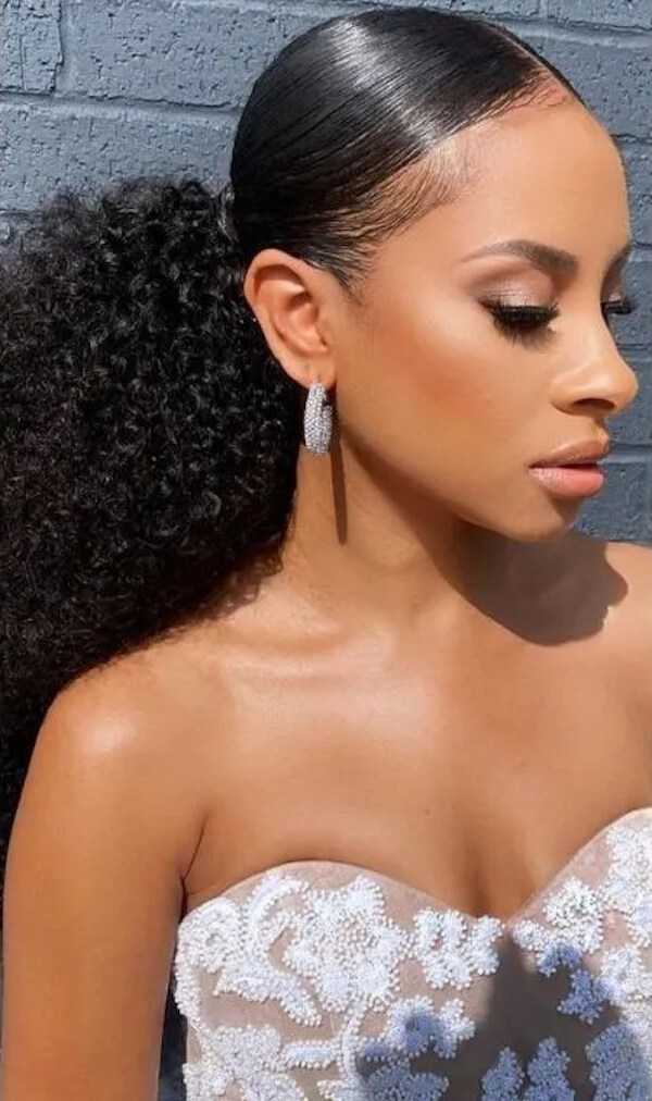 Sleek Curly Low Ponytail