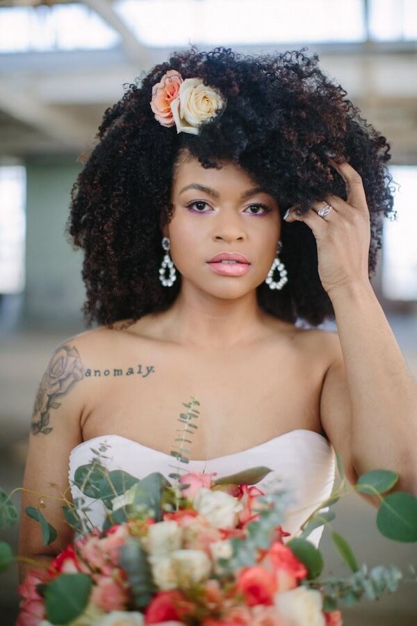 Voluminous Afro with Floral Details