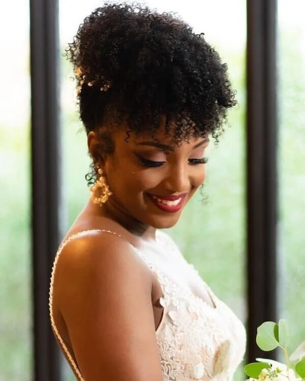 Curly Bun with Bangs