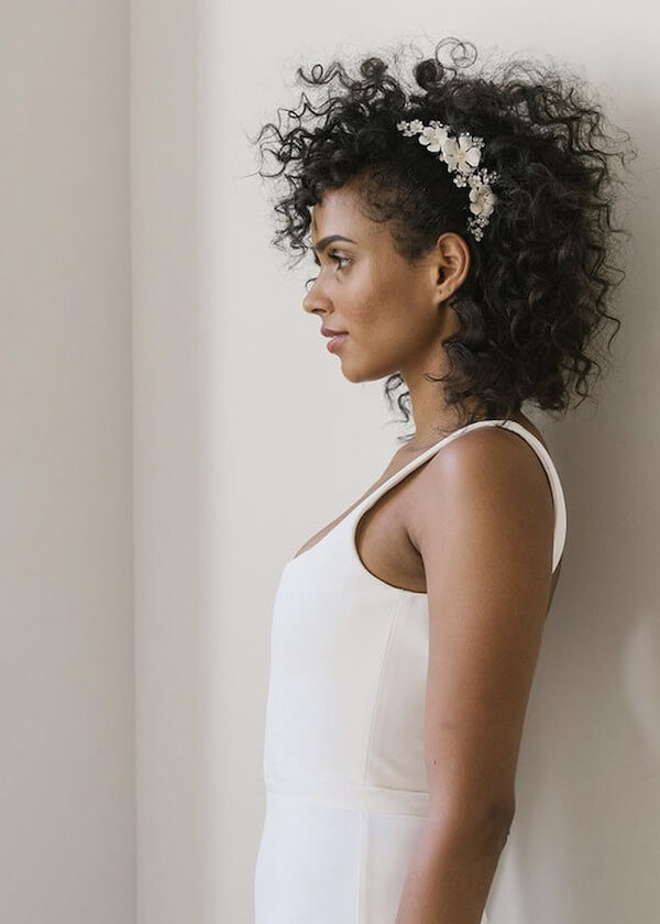Curly Updo with Chic Floral Hairpiece
