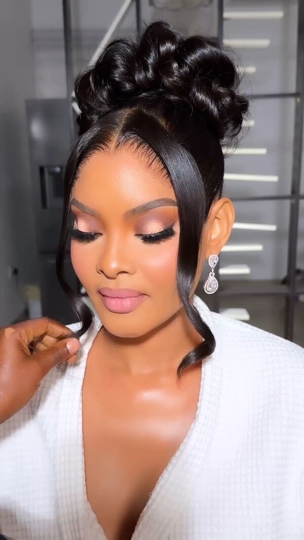 Chic Double Bun with Face-Framing Curls