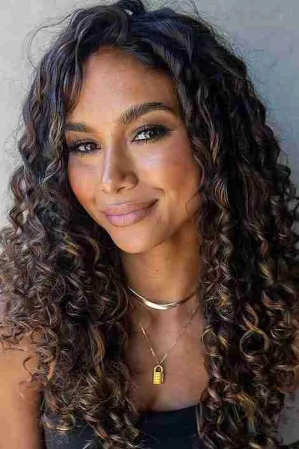 Defined Curly Hair with Middle Part