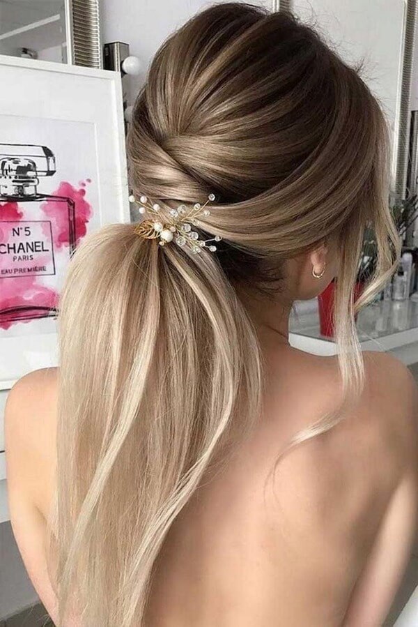 Voluminous Ponytail with Decorative Hairpin