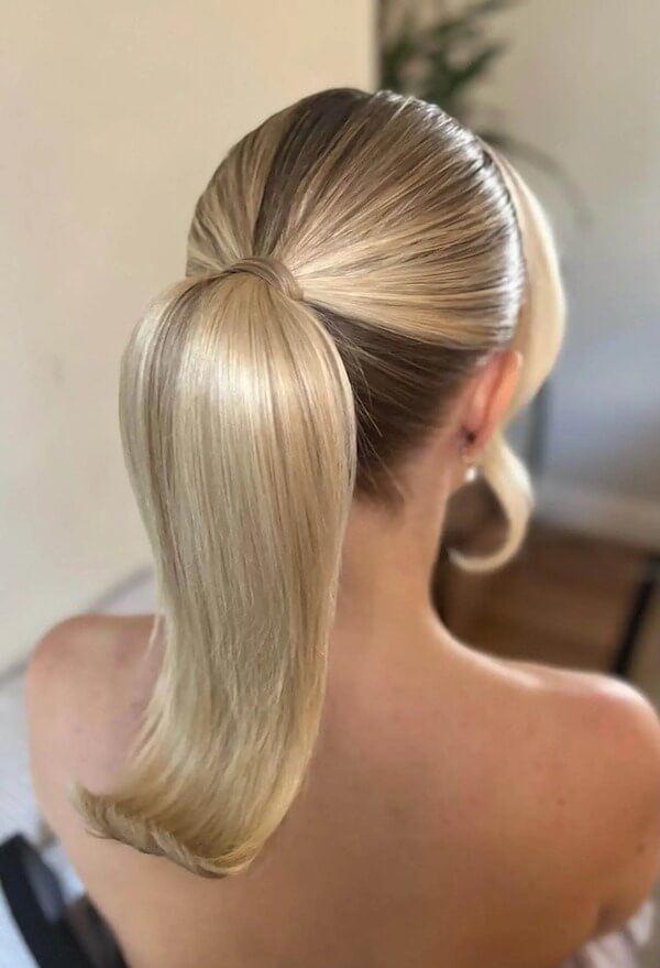 Retro-Inspired Flipped Ponytail