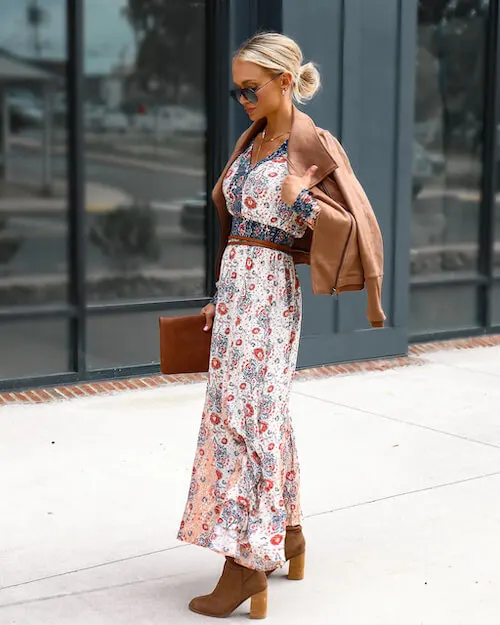 brown leather jacket and a maxi floral dress