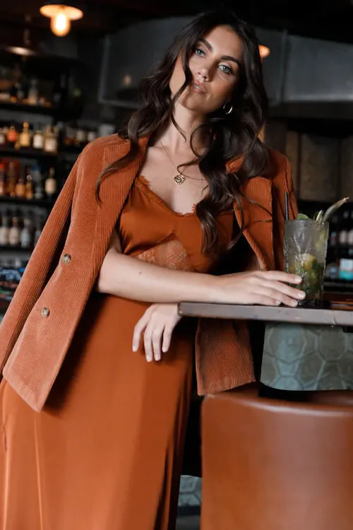 burnt orange dress and coat