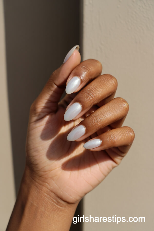 Glossy White Nails With Subtle Shimmer