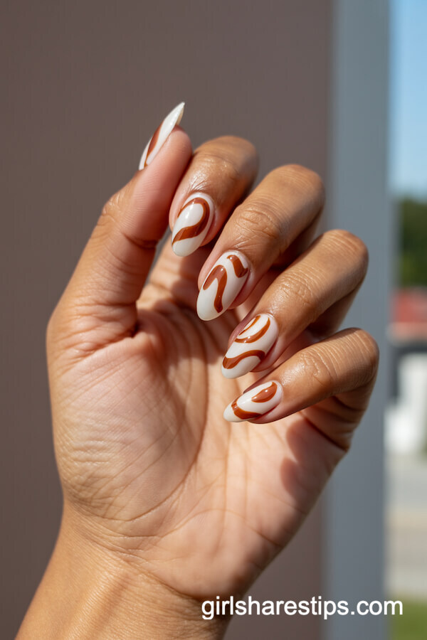 White Nails With Abstract Brown Swirls