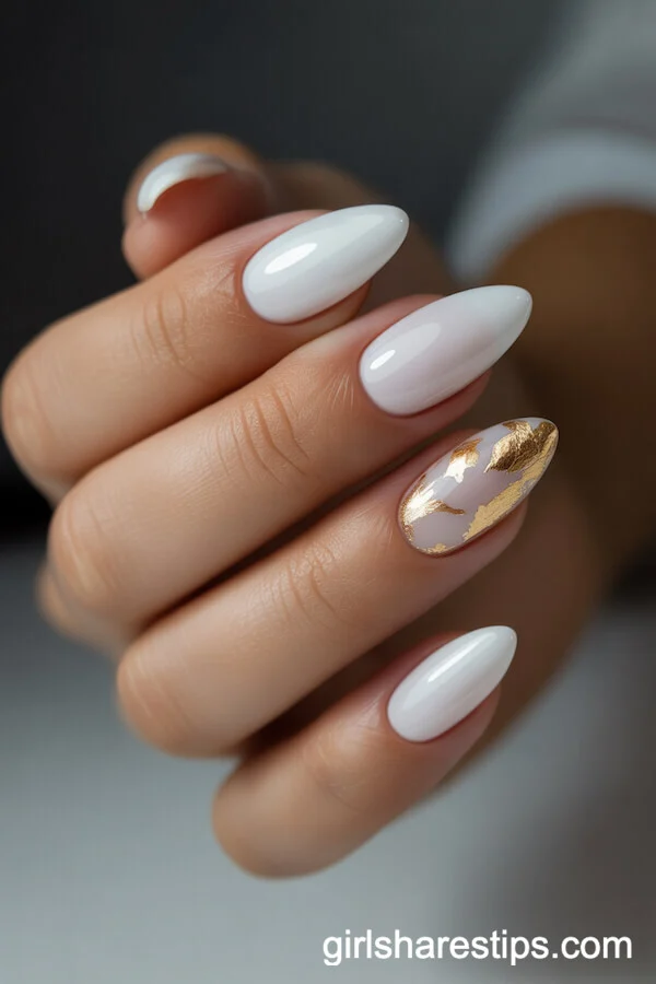 Pure White Almond Nails with Gold Leaf Accents
