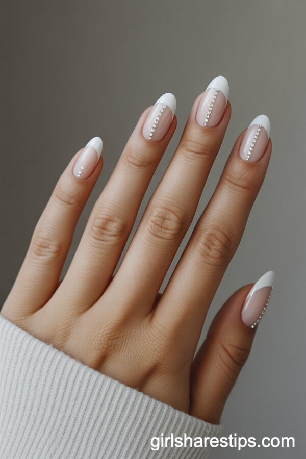 Sheer White Almond Nails with Rhinestone Stripe Accent