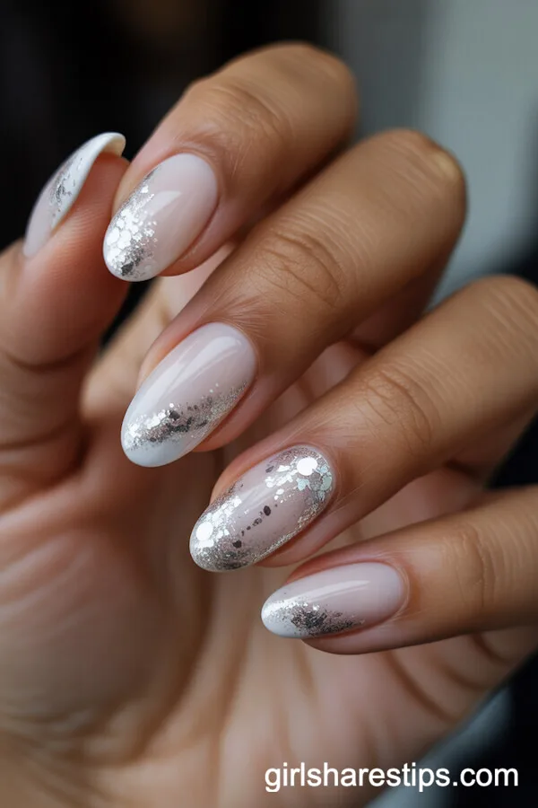 Oval White Nails with Shimmering Silver Glitter Accents