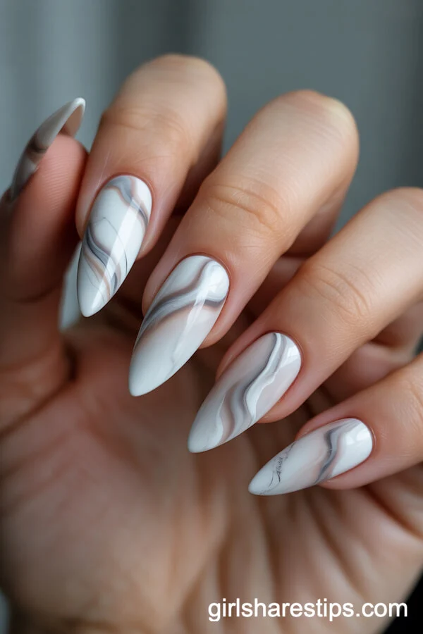 White Stiletto Nails with Elegant Marble Effect