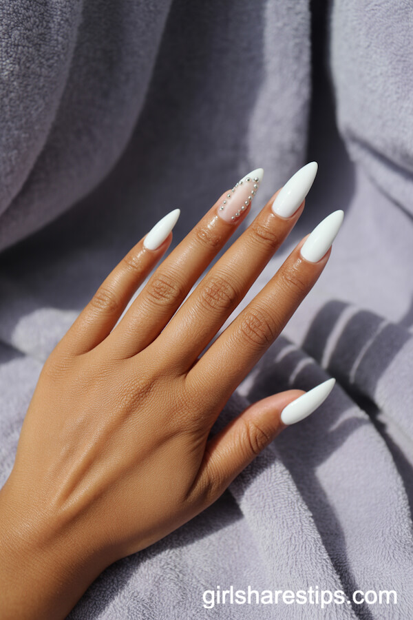 Matte White Stiletto Nails with Silver Stud Accent