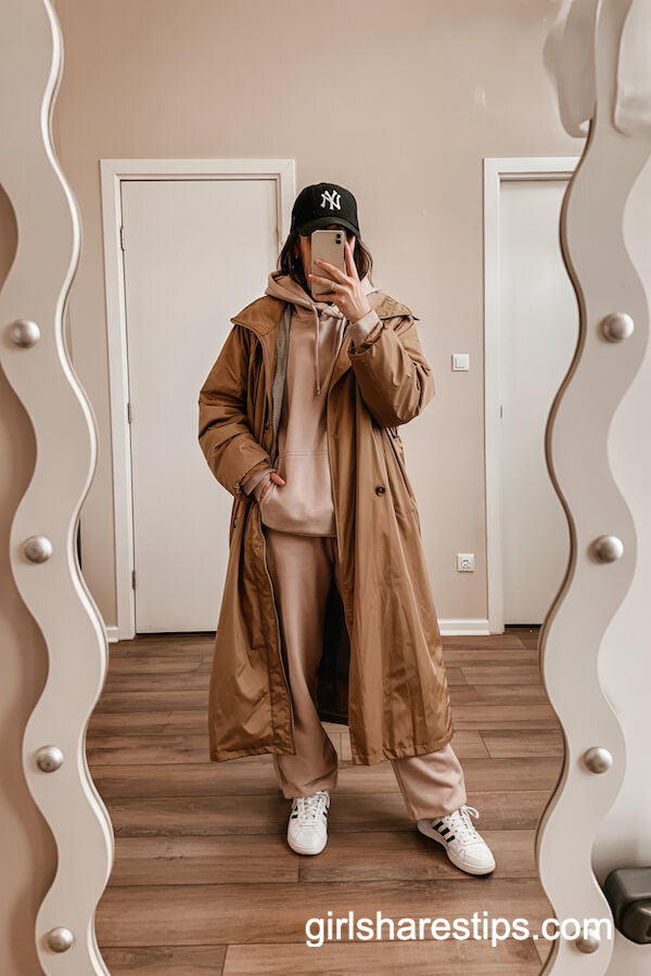Tan Trench Coat Over Hoodie and Sneakers