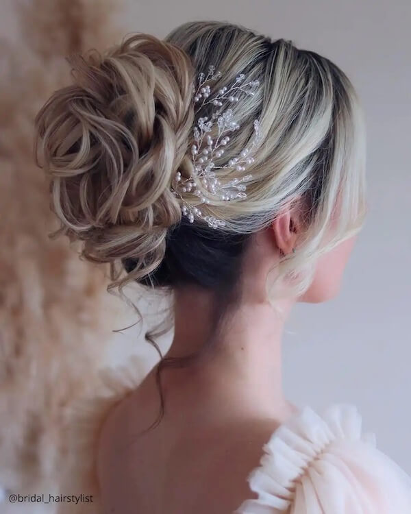 Elegant Curly Updo with Silver Hair Vine