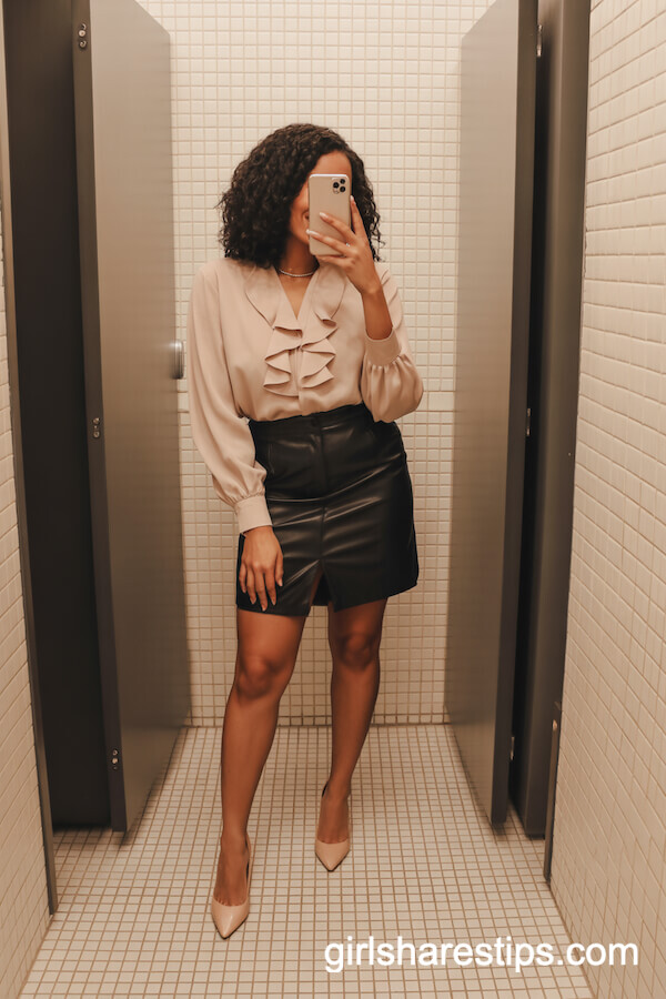 Blush Ruffled Blouse with Black Leather Skirt