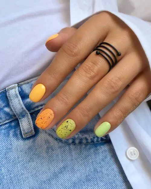 Easter Egg Pastel Spring Nails With Yellow Nail Polish